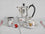 Silver Coffee Pot with Cups and Chocolate