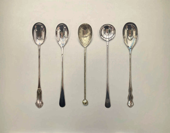 Five Long Silver Spoons